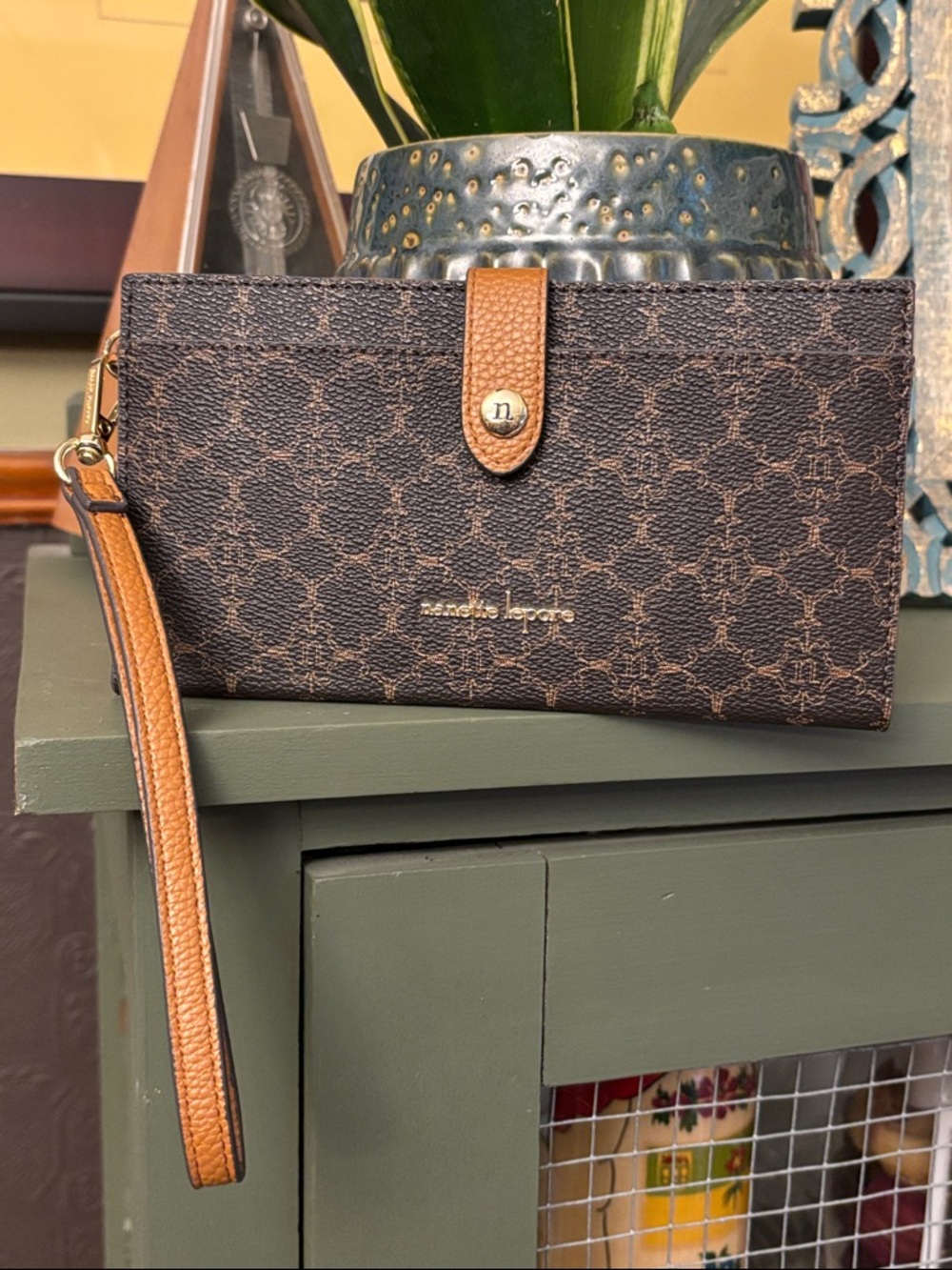 Nanette Lepore Brown Logo Wristlet with Tan Trim, in great condition